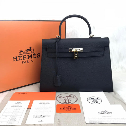 Kelly 32 | Togo-Leder | Palladium-Beschläge.