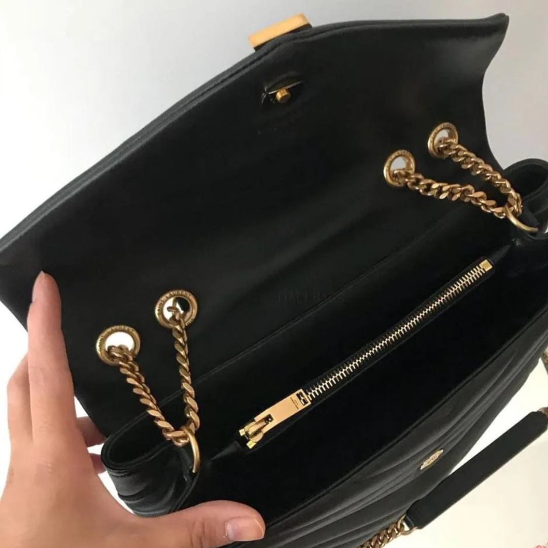 Yves Saint Laurent Set – Handtasche und Sandalen.